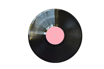 Old vinyl record isolated on a white background.