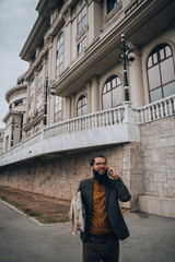 Stylish businessman outdoors