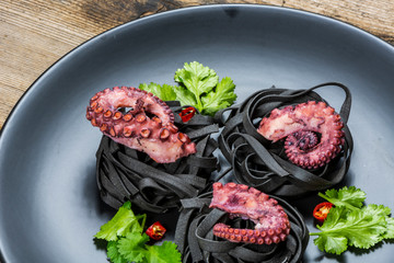 octopus with black  spaghetti