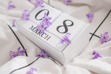 White infinite calendar on white background with 8 march date. International woman's day
