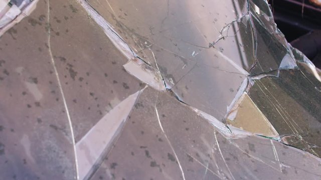 broken dusty windshield closeup shot