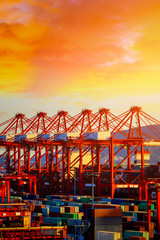 Fototapeta na wymiar Industrial container freight port at beautiful sunset in Shanghai,China.