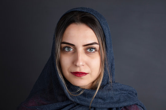 portrait of blue eyed middle eastern woman