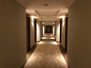 Empty Corridor with Doors in Luxurious Hotel