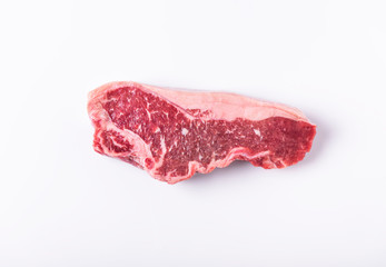 Fresh raw rib eye beef steak isolated on white background. top view