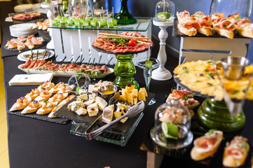 Buffet table for celebration with different dishes