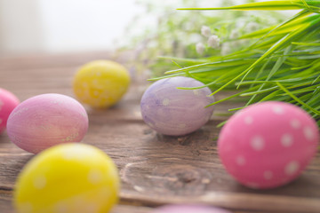 Easter eggs on a old wooden surface