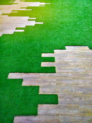 garden decoration with flooring artificial grass, backyard with decorative modern building,space for activity area
