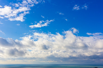 Naklejka na ściany i meble Natural landscape background, bright blue sky with white cumulus cloud
