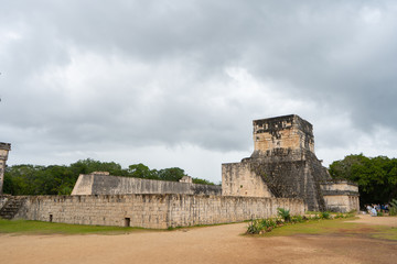 Fototapeta na wymiar The Great Ball Court. Chichen Itza archaeological site. Architecture of ancient maya civilization. Travel photo or wallpaper. Yucatan. Mexico.