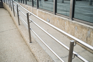 Metal railings and glass wall outdoor near sea