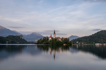Fototapeta premium Sunset landscapes of Bled Island in Bled Lake, Slovenia