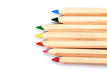 colored pencils isolated on white background. close up