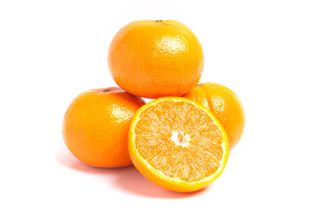 Fresh orange and leaves isolated on white background.