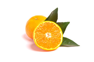 Fresh orange and leaves isolated on white background.