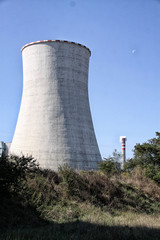 Tall concrete cooling tower of power plant