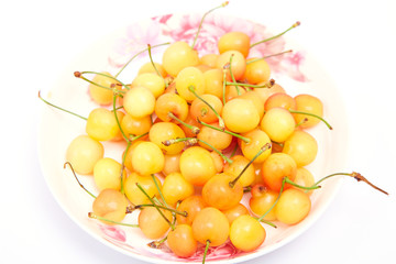 Fresh yellow cherries on the table