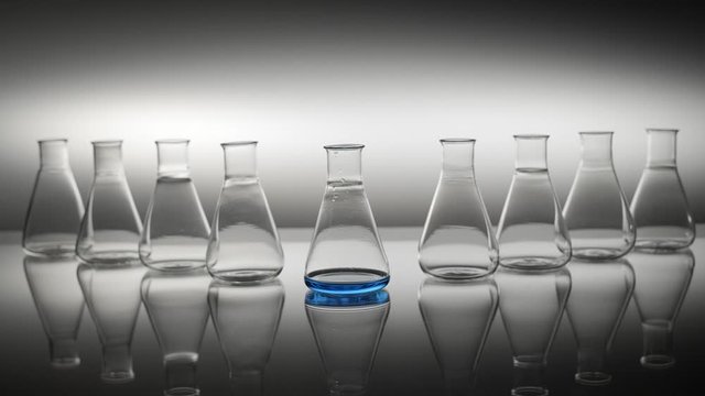 Empty erlenmeyer flask lift off the table.