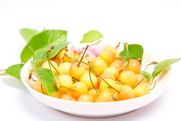 Fresh yellow cherries on the table