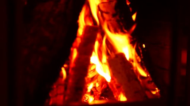 a fire is burning in the fireplace