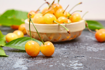 Fresh yellow cherries on the table