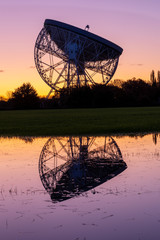 Sunrise at the Lovell Telescope at Jodrell Bank in the Cheshire landscape - a UNESCO World Heritage Site. Radio Telescope Centre for Astrophysics at the University of Manchester