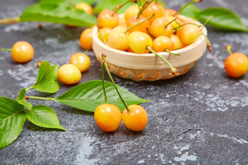 Fresh yellow cherries on the table