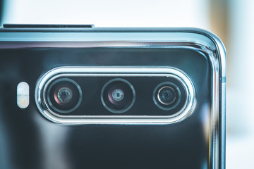 Mobile phone with triple lens. Camera innovation.