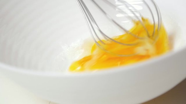 Beat eggs with sugar - crepes dough making
