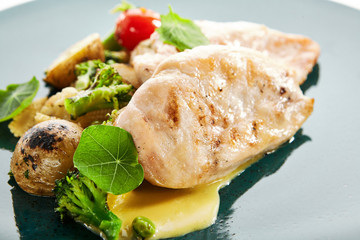 Chicken fillet with vegetables and cream sauce