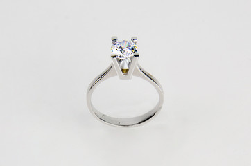 A ring with diamond on white background