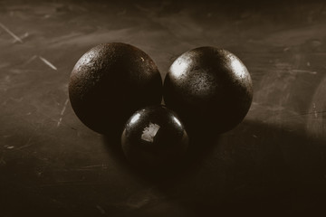 voluminous metal products on a dark background