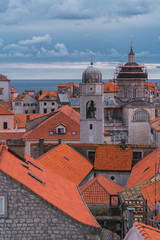 Fototapeta na wymiar View of Dubrovnik old town buildings and red roofs from the city wall