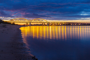 Bridge with reflection in the Volga river in Nizhny Novgorod