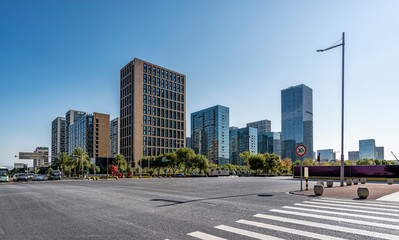 Modern building office building and city street in Ningbo business district..