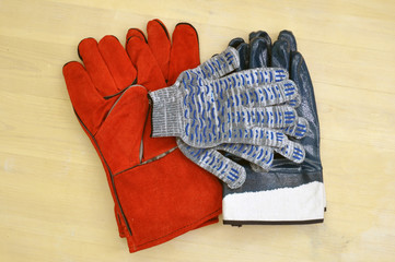 Personal protective equipment for hands. Peraki welder tarpaulin. Rubberized gloves. Cotton gloves.
