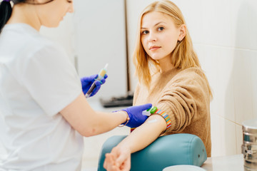 Fototapeta premium man in laboratory in during blood research