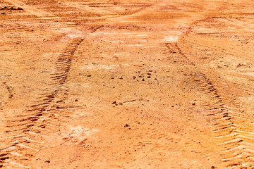Tired track on the ground.
