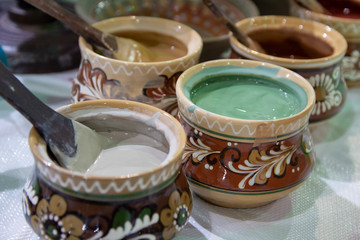 Clay pots are handmade with colorful paint. Ukrainian Folklore