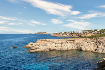 Paisaje hermoso y bucolico de verano, en mar mediterraneo y acantilados de cala llentia de la isla de Ibiza, Baleares,España