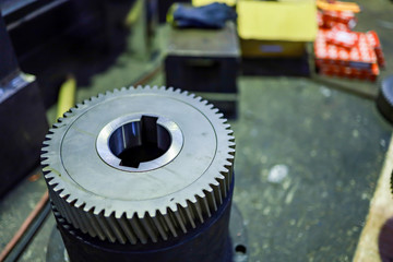 spare part gear wheels and on floor wait for assembly