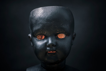 Creepy doll in the dark