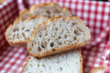 slice of bread in bread basket, whole graine bread