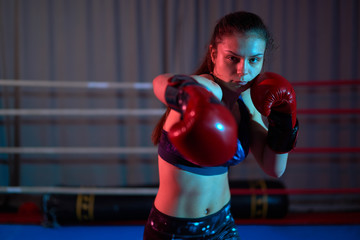 Female kickboxer training