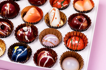 Box of Luxury Bonbons Painted with Differents Colors in White Box Beautiful and Exclusive Handmade Chocolate Candy Horizontal