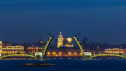 Fototapeta na wymiar Night view of spit of opened Birzhevoy Bridge timelapse, Saint Petersburg, Russia.