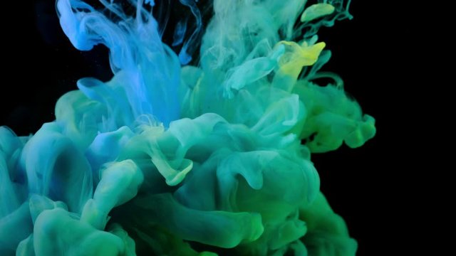  4K, Color drops in water, abstract color mix, drop of Ink color mix paint falling on water Colorful ink in water, 4K footage,