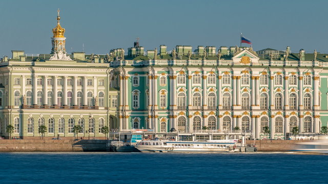 Tourists in the excursion boat sail on The Neva River timelapse. On the back side is The State Hermitage Building Winter Palace