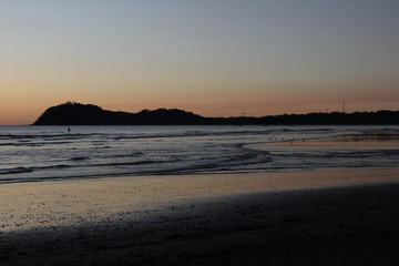 sunset evening at Playa Samara, envening mood and light of two campers, Costa Rica, Central America