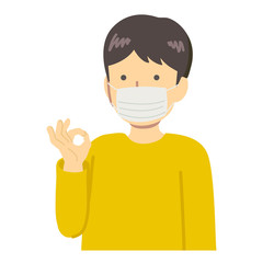 黄色い服を着てマスクをした男の子